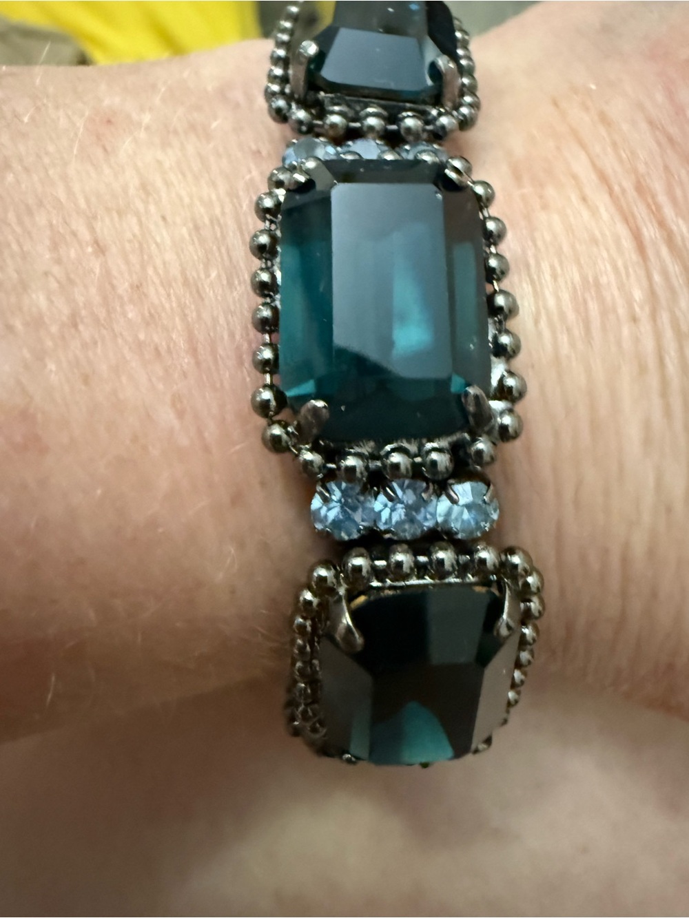 Blue stretchy emerald cut bracelet.